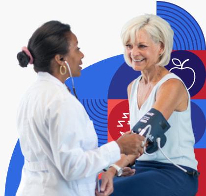 Woman getting her blood pressure checked by health care provider.