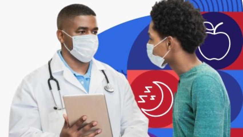 A doctor is wearing a face mask and holding a medical chart while talking with a masked patient. 